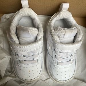 Baby white Nikes. Size 5